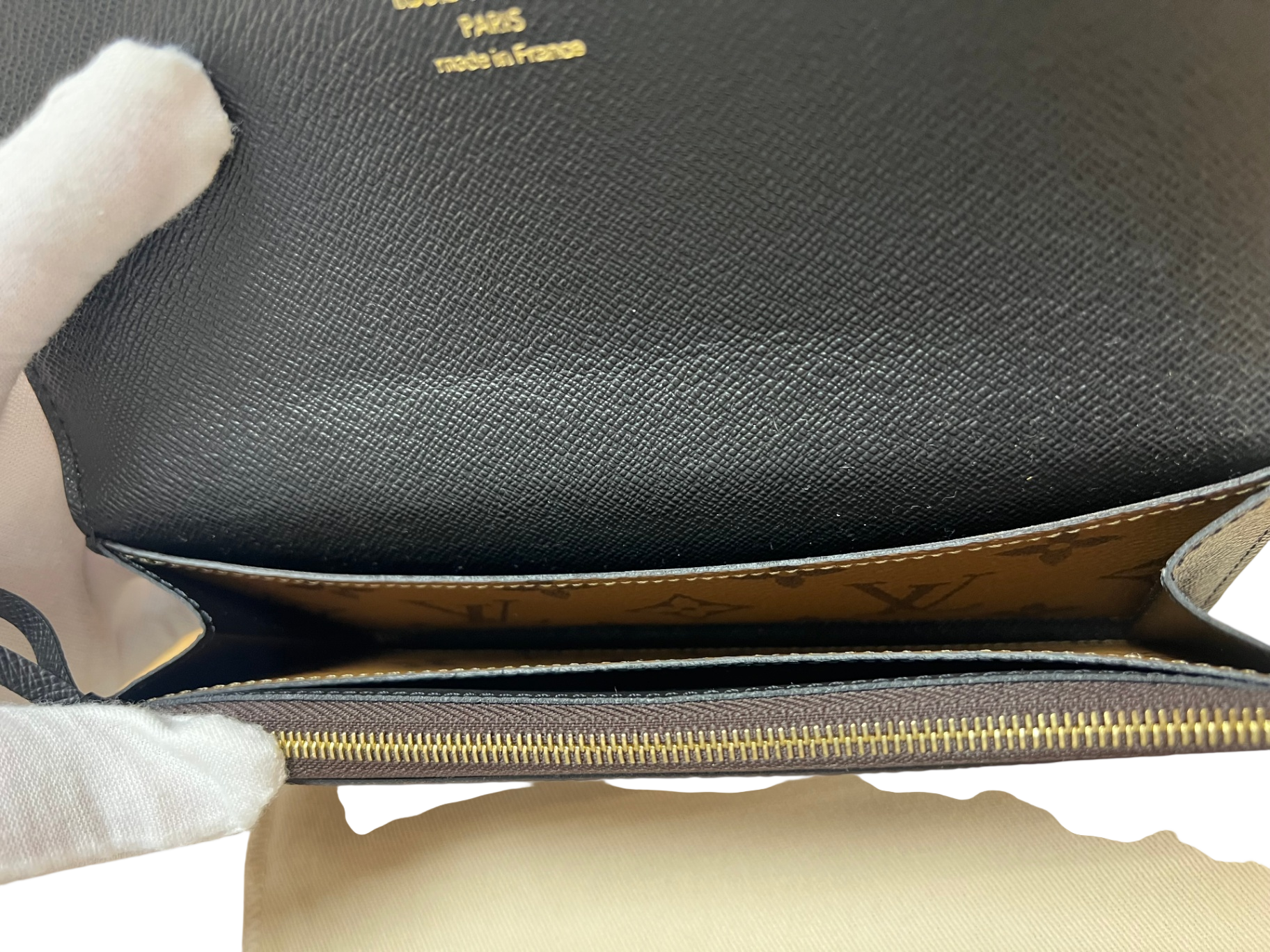 Louis Vuitton Emilie wallet, brown, black, gold coated canvas with two-tone monogram