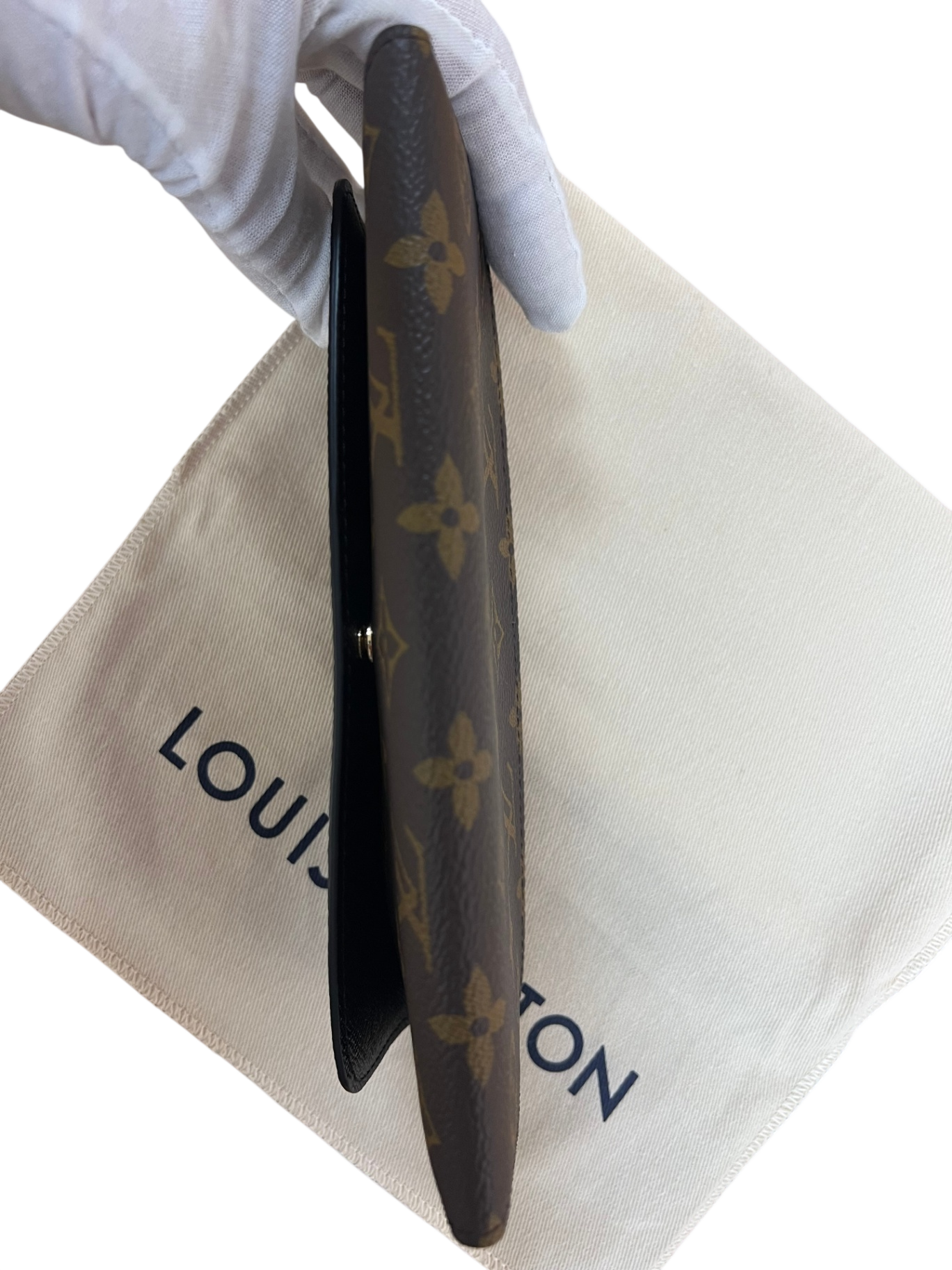 Louis Vuitton Emilie wallet, brown, black, gold coated canvas with two-tone monogram