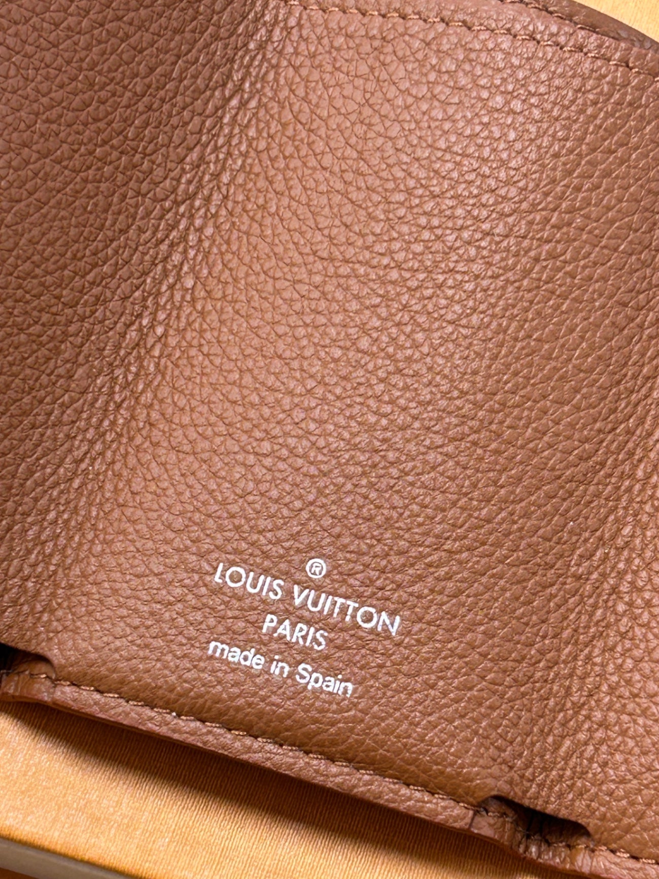 Louis Vuitton Portemonaie Lockmini Braun